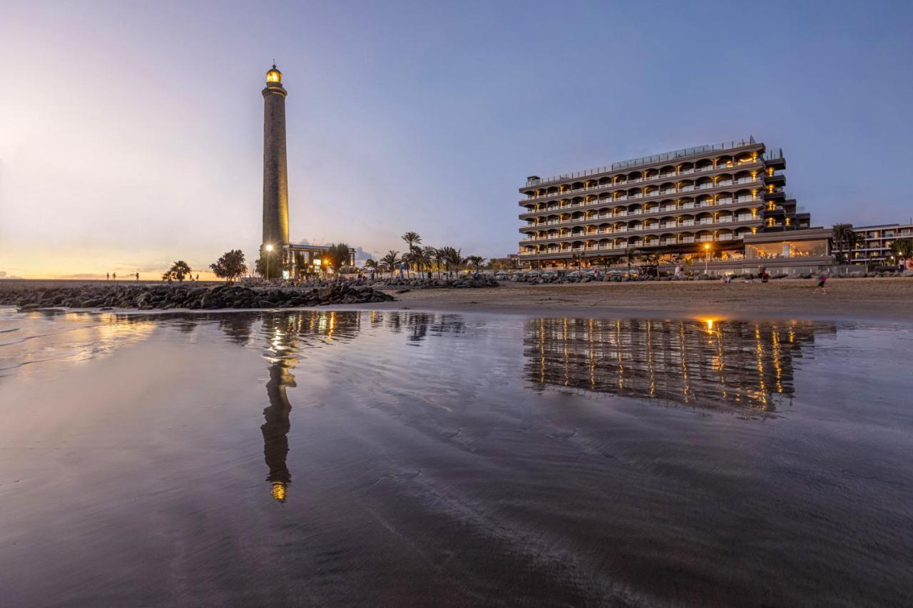 Hotel Faro, A Lopesan Collection Hotel - Adults Only 马斯帕洛马斯 外观 照片 The lighthouse and the hotel at night