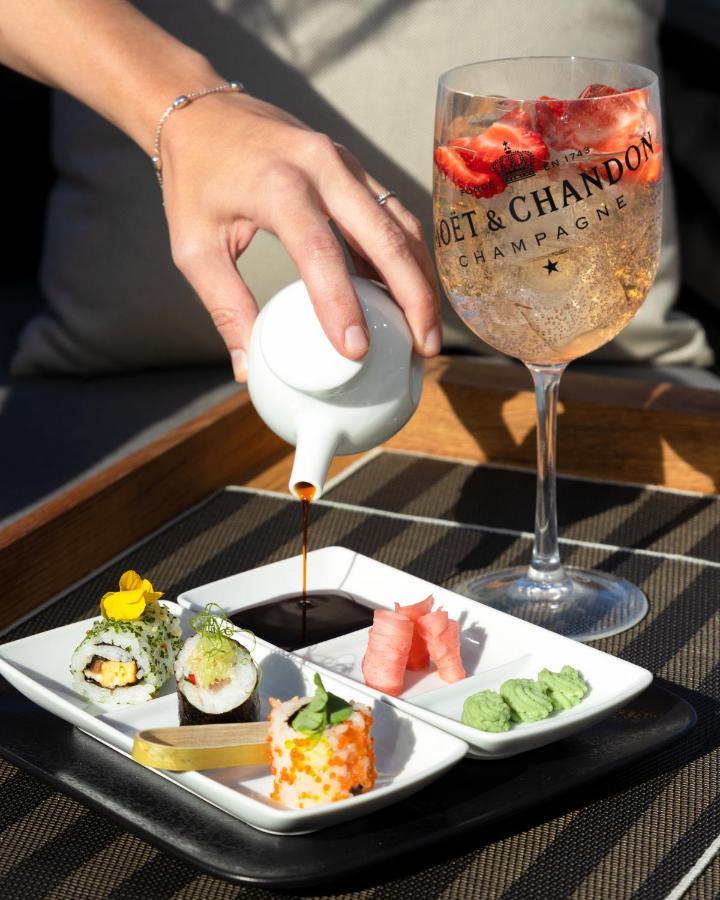 Hotel Faro, A Lopesan Collection Hotel - Adults Only 马斯帕洛马斯 外观 照片 Soy sauce being used with sushi